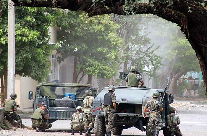 Mexikanische Soldaten bei einer Operation gegen Kartellmitglieder in Michoacan