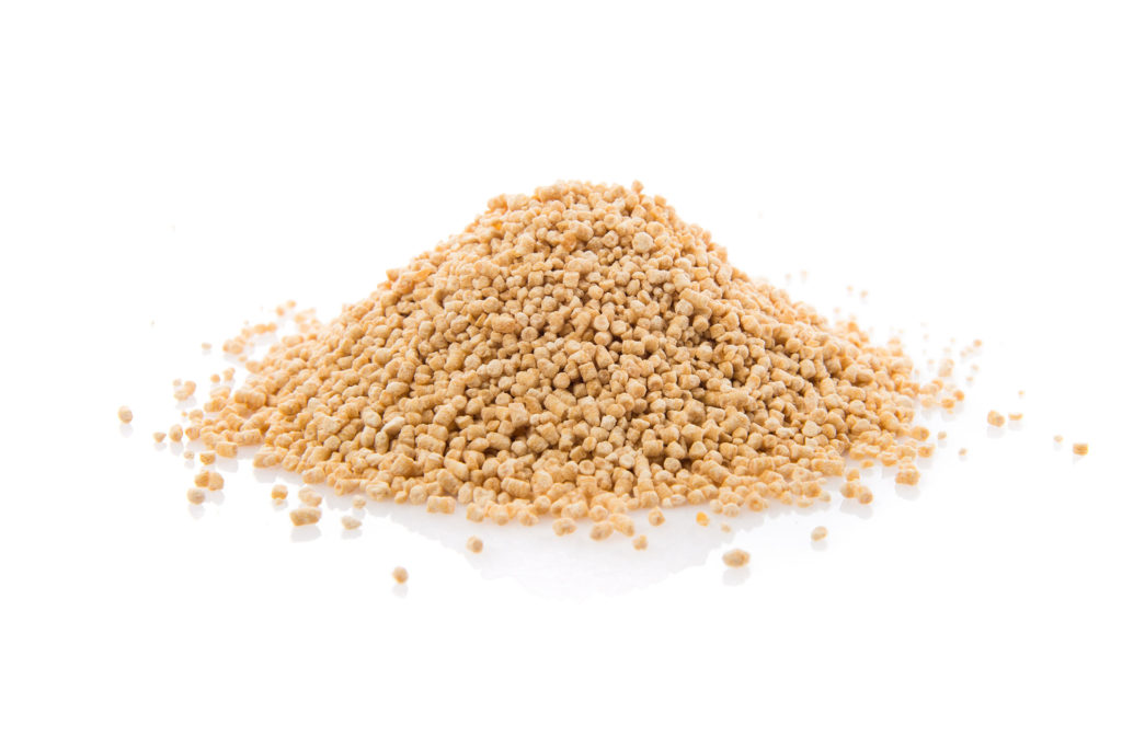 A mound of dried weed against a white background