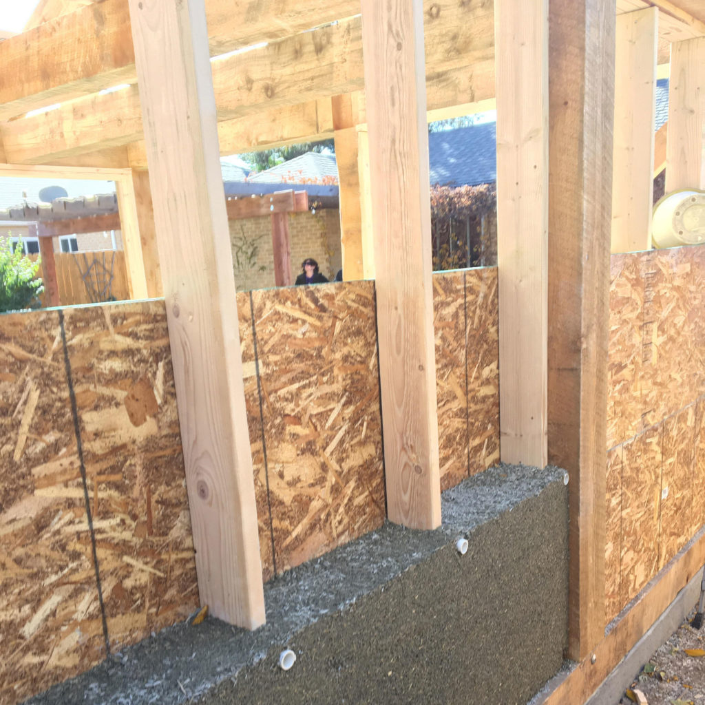 A house under construction and hemp building material