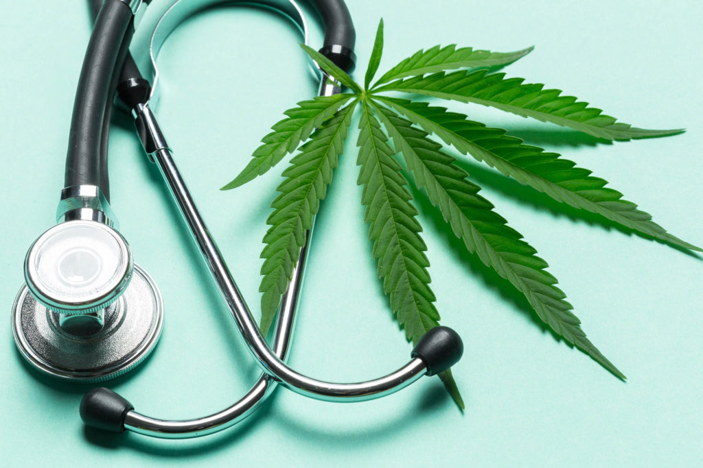 A stethoscope and a cannabis leaf