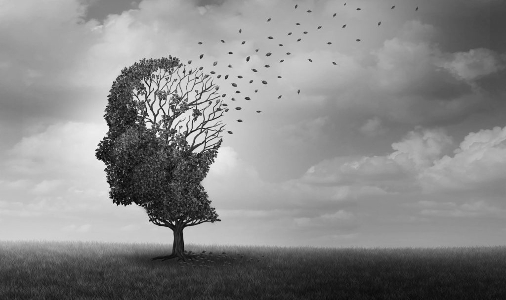 A head-shaped tree with wind blowing out the leaves 