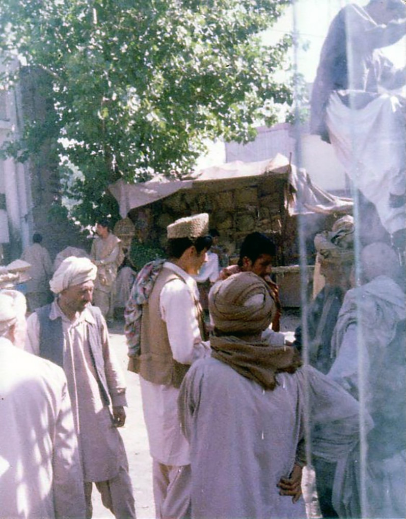 A crowd of Pakistani residents at a market