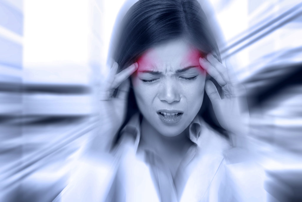 Woman with migraine