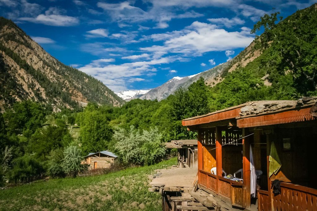 A mountain landscape with small wooden houses