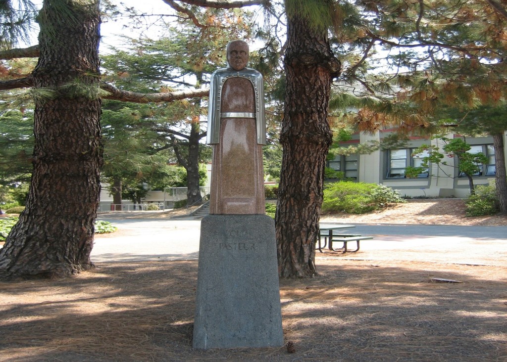 Louis Pasteur statue in a park