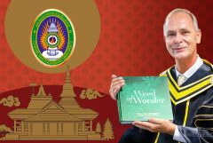 Rajabhat University logo, a temple and Alan Dronkers holding a book “Weed of Wonder”